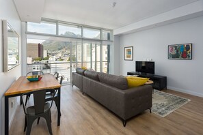 Deluxe Apartment | Living area | Flat-screen TV - Sentinel 711 (Cape Town)