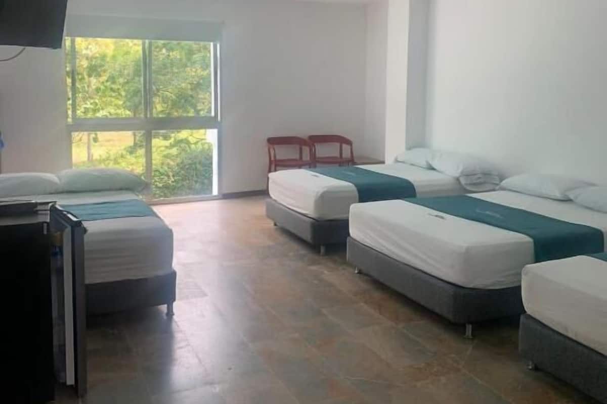 Standard Quadruple Room, Pool View | Free WiFi