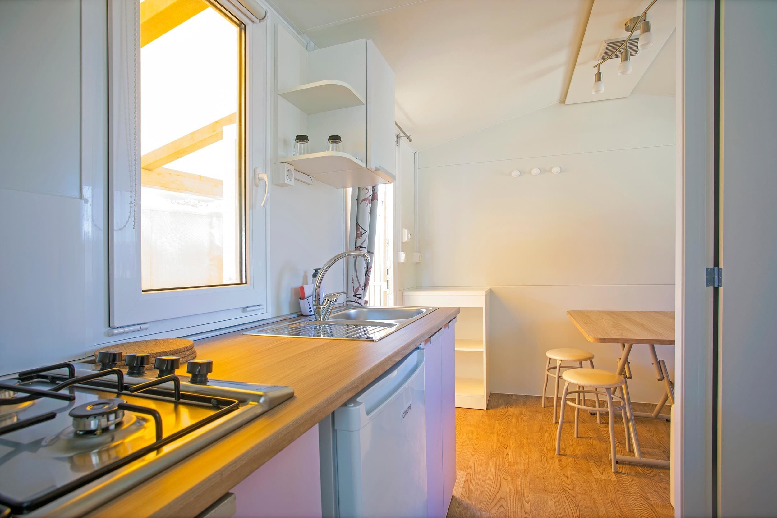Mobile Home, Non Smoking | Private kitchenette | Fridge, stovetop, highchair, cookware/dishes/utensils