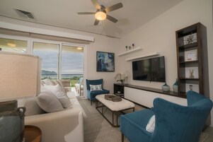 Condo, Multiple Beds (Los Suenos Resort Miramar 5D Condo), 3 bedrooms | Living area | Flat-screen TV