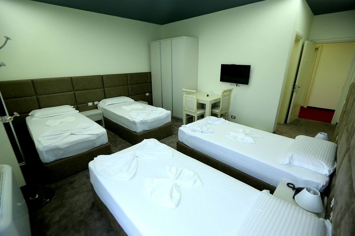 Classic Quadruple Room, Multiple Beds, Non Smoking | WiFi, bed sheets, wheelchair access