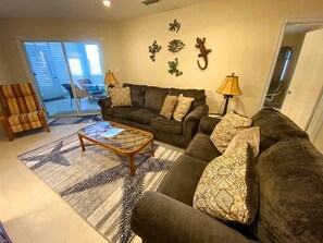 TV, DVD player, books, stereo - Steps to Sand & Sea - Oceanfront Condo with Pool in Quiet Cayman Kai/Rum Point (Cayman Kai, Rum Point)