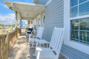 Terrace/patio - Experience luxury in Oak Island at 'Isle Be Seaing You,' featuring 4 beds and a private pool. (Oak Island)