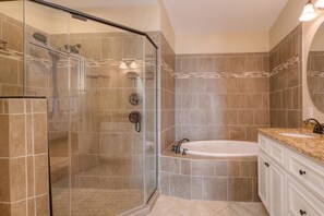 Shower, jetted tub, towels