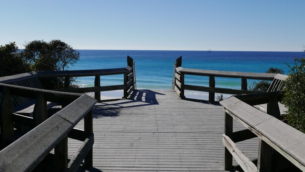 A wooden boardwalk leading to a beach with clear blue water. - Hidden Beach Hideaway — 200 Yards to Sand, Free Bikes, Pool & WiFi (Seagrove Beach)