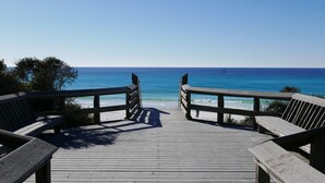 A wooden boardwalk leading to a beach with clear blue water. - Hidden Beach Hideaway — 200 Yards to Sand, Free Bikes, Pool & WiFi (Seagrove Beach)