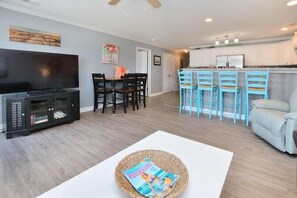 Living area - Experience ocean views at Oak Island OW 5104, a spacious 3-bedroom condo for 8. (Oak Island)