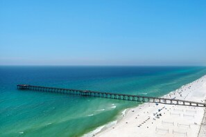 On the beach, sun-loungers