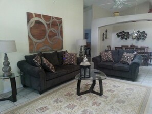 House, 6 Bedrooms, Private Pool (4 Bathrooms - 2652OL) | Living room | TV - 6BR Indian Creek Pool Home by FVM (Kissimmee)