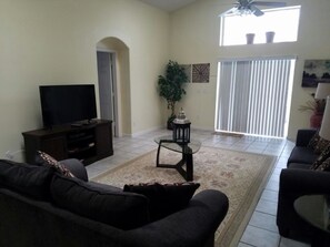 House, 6 Bedrooms, Private Pool (4 Bathrooms - 2652OL) | Living room | TV - 6BR Indian Creek Pool Home by FVM (Kissimmee)