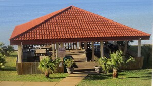 A gazebo with a red roof overlooking a body of water. - Quiet Island getaway 30% off Fall/Winter stays! Private Fishing Pier, PERFECT! (Navarre)