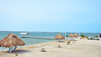 On the beach, sun loungers