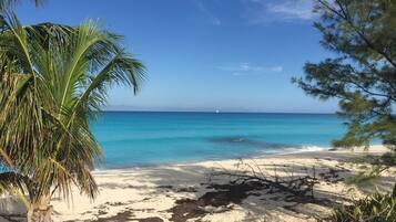 On the beach, sun loungers, beach towels