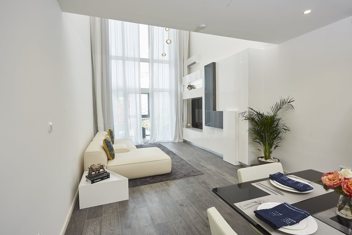 Duplex Suite With City View | Living area | Flat-screen TV