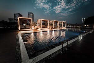 Outdoor pool, open 7 AM to 9 PM, sun loungers