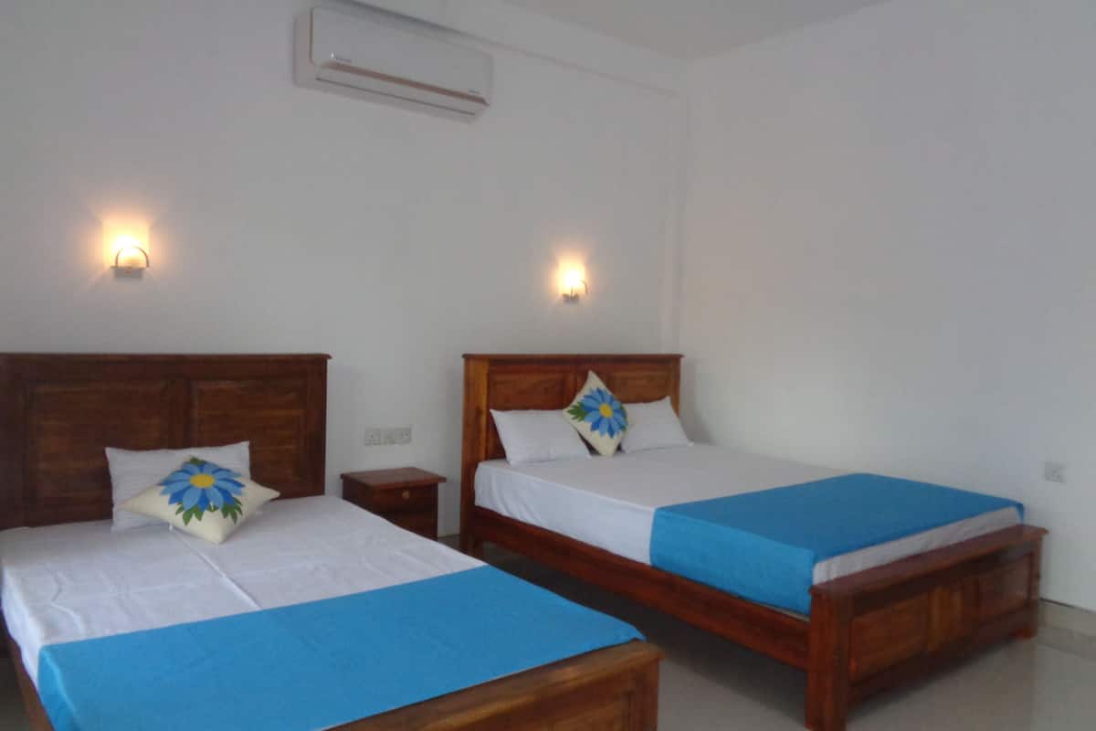 Triple Room with Air-con | Sengetøy