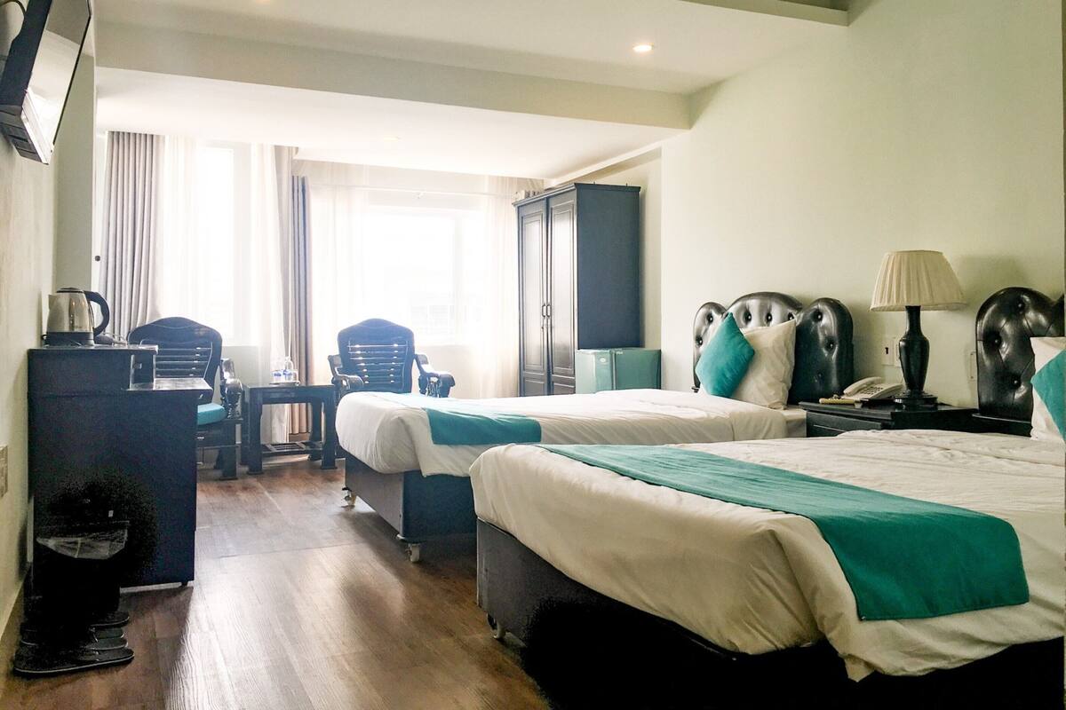 Minibar, desk, blackout drapes, soundproofing