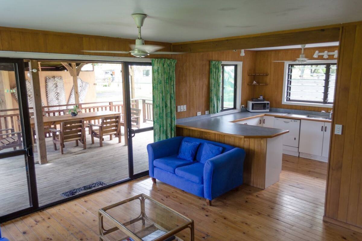 3 bedroom riverview villa | living area | flat-screen tv