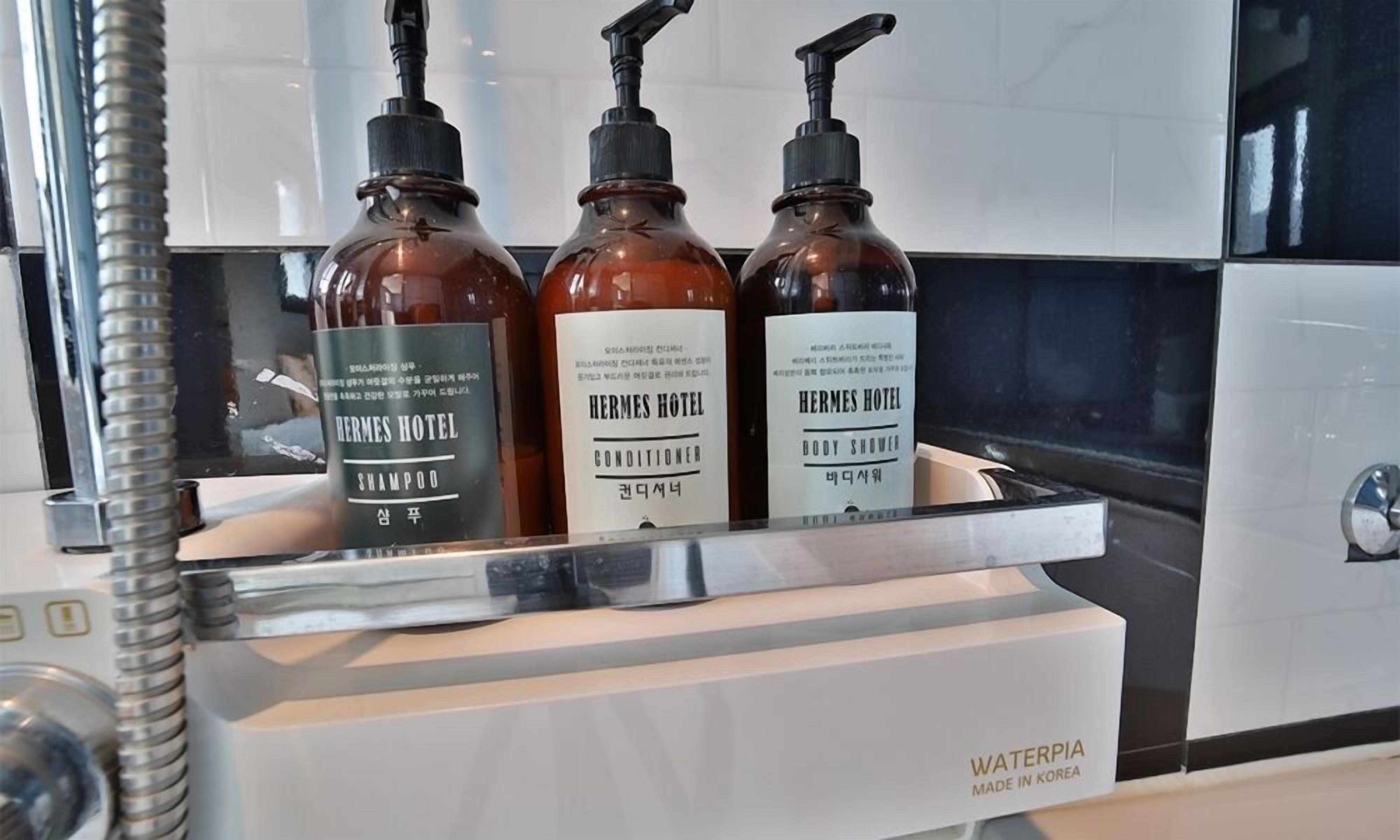 separate bathtub and shower, free toiletries, hair dryer, slippers