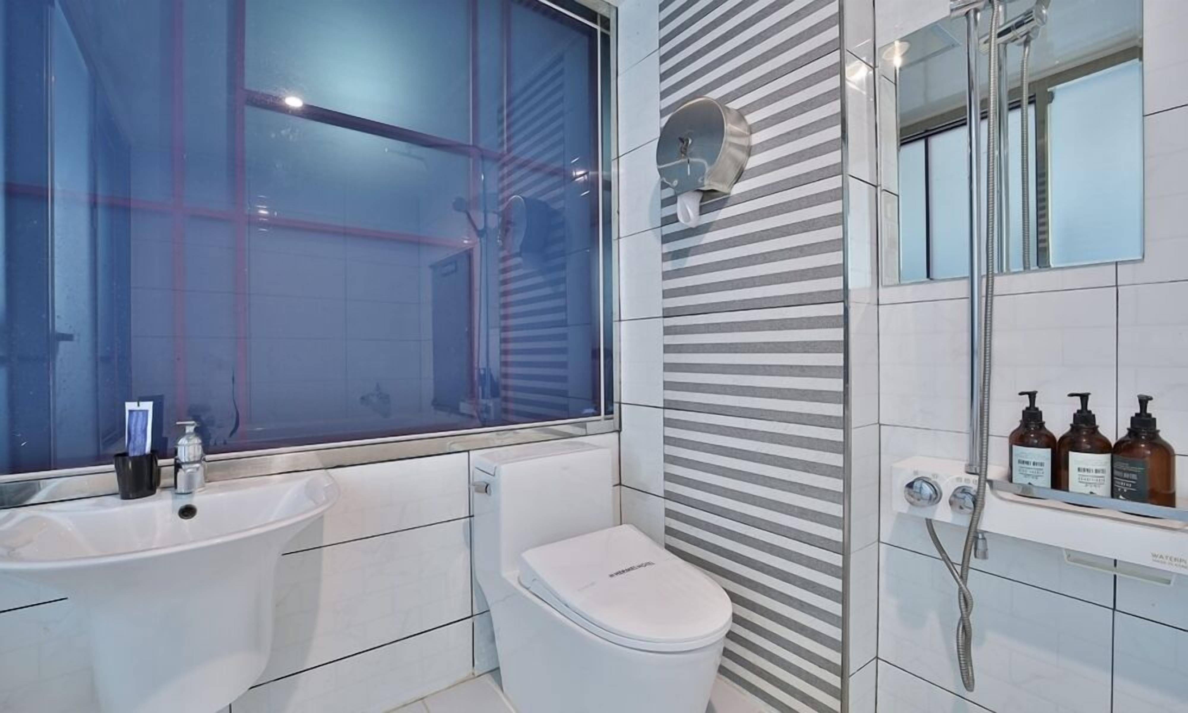 separate bathtub and shower, free toiletries, hair dryer, slippers