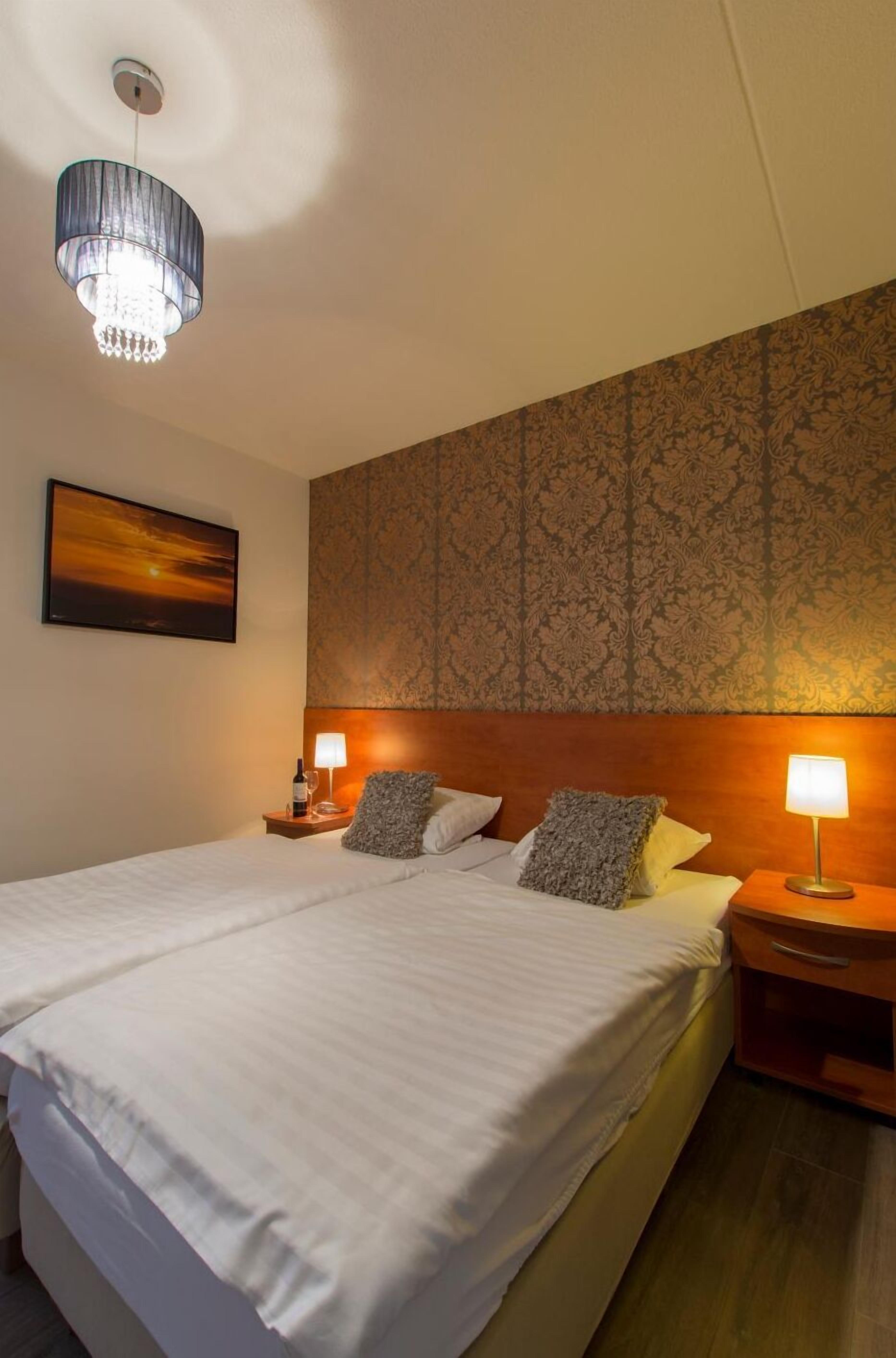 premium bedding, desk, blackout curtains, free wifi