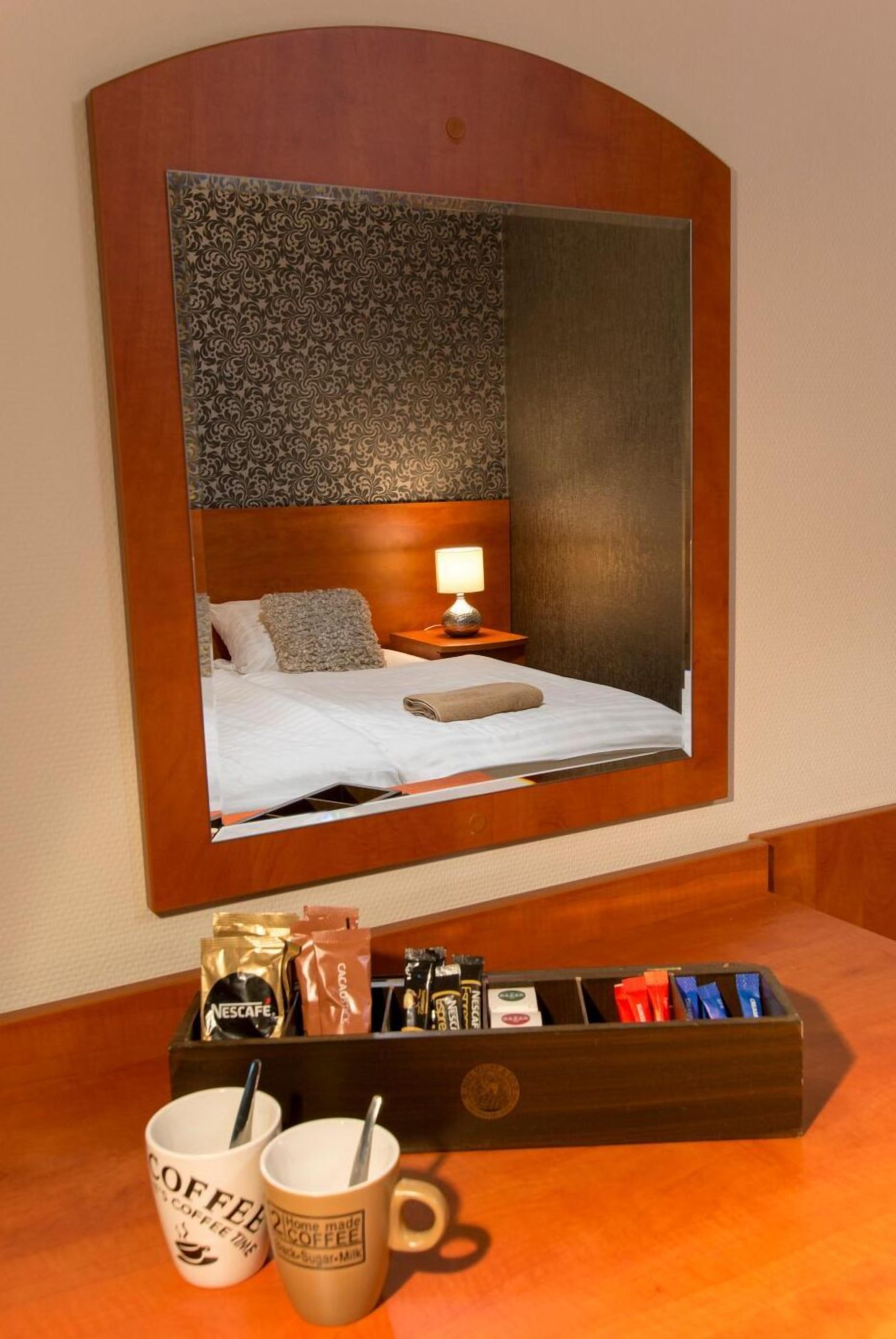 premium bedding, desk, blackout curtains, free wifi