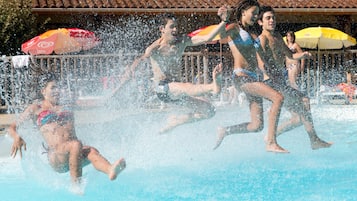 2 outdoor pools, pool umbrellas, pool loungers
