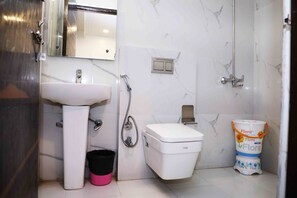 Douche, articles de toilette gratuits, serviettes fournies