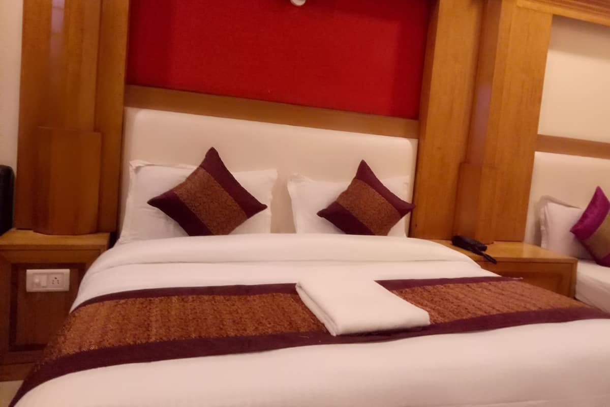 Habitación doble Deluxe | Camas extra y wifi gratis