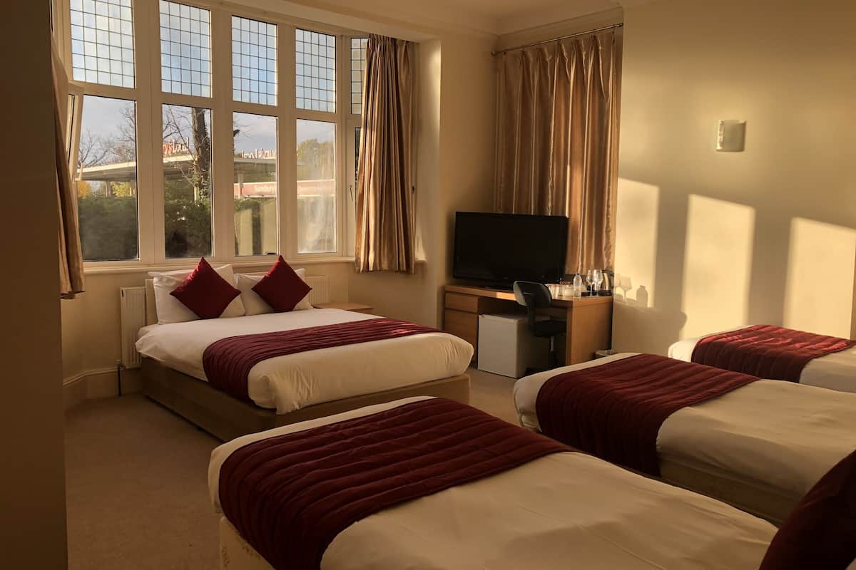 family room, private bathroom | individually decorated, desk, laptop workspace, soundproofing