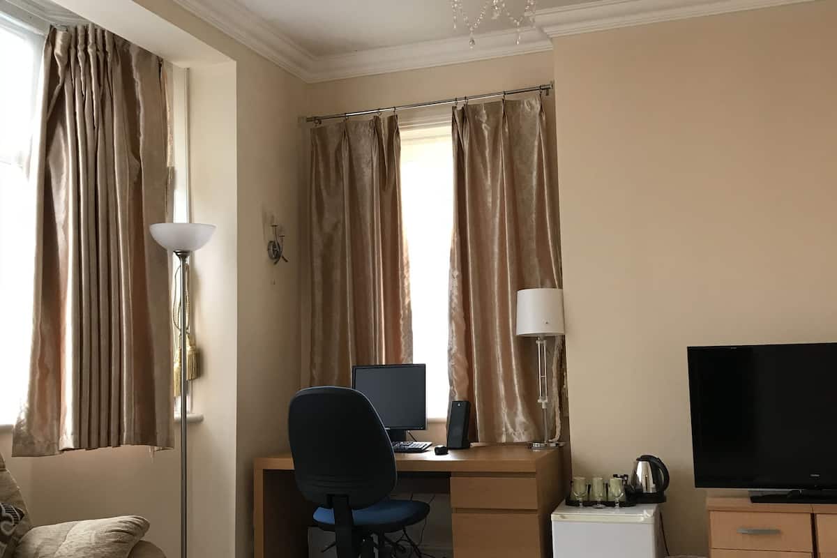 luxury triple room | individually decorated, desk, laptop workspace, soundproofing