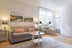 Apartment, 2 Bedrooms | Living area | Flat-screen TV, iPod dock - acora Kiel Living the City (Kiel)