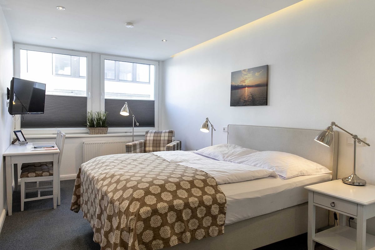 apartment | premium bedding, down duvets, individually decorated
