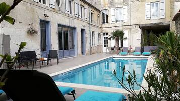 Seasonal outdoor pool, sun loungers