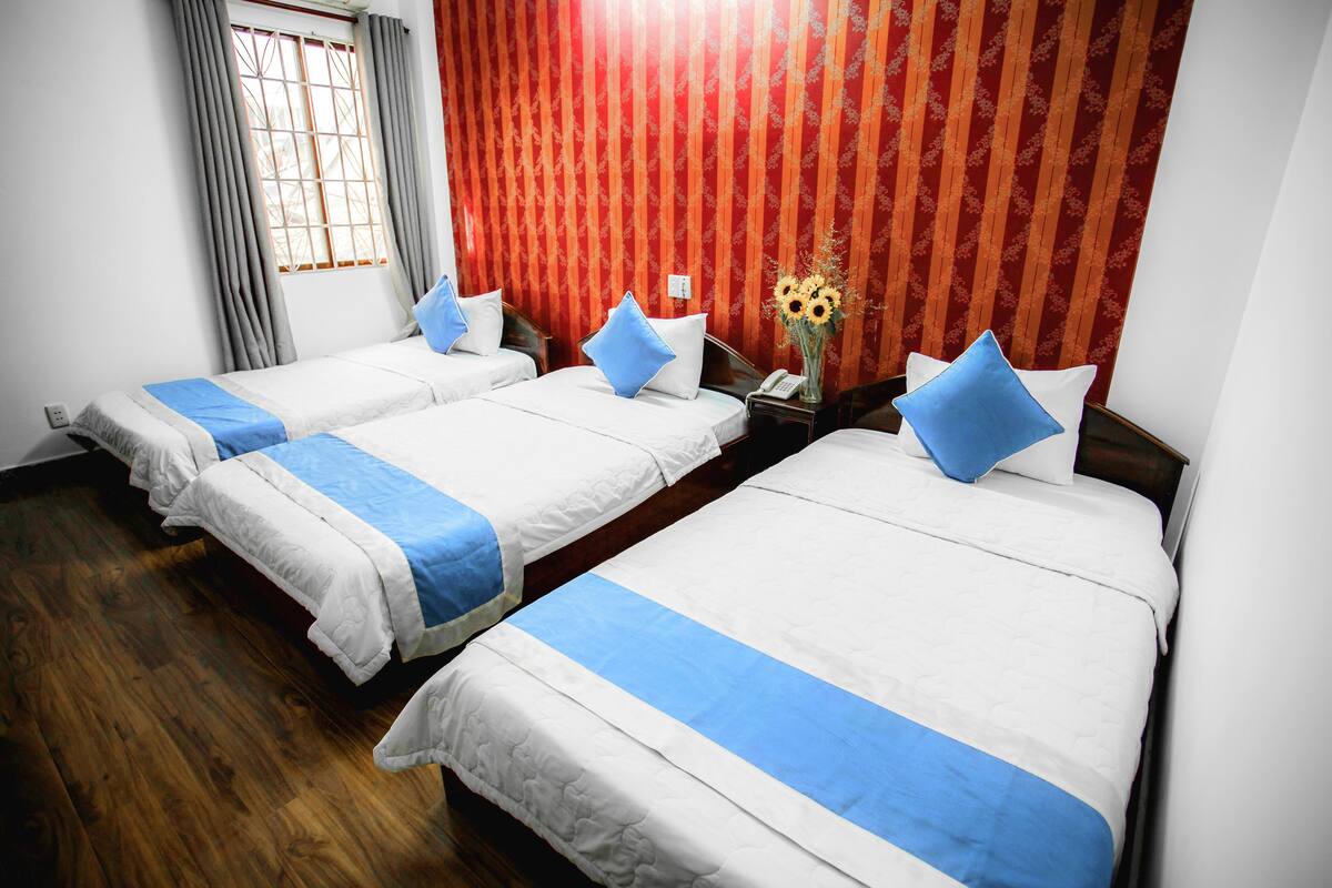 Triple Room | Minibar, in-room safe, desk, soundproofing
