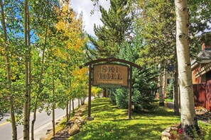 Escape to a serene residential community surrounded by lush greenery and mature trees.