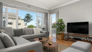 Comfort Apartment | Living area | Flat-screen TV