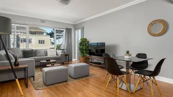 Comfort Apartment | Living area | Flat-screen TV