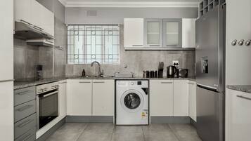 Comfort Apartment | Private kitchen | Fridge, microwave, oven, stovetop