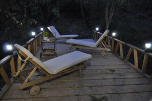 Outdoor pool, open 11:00 AM to 8:00 PM, pool umbrellas, pool loungers