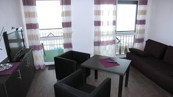 42-inch TV with satellite channels, table tennis