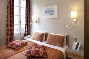 Ropa de cama de alta calidad y minibar