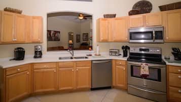 Family Villa, Private Pool, Garden Area | Shared kitchen | Fridge, microwave, oven