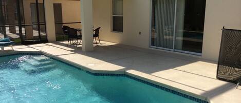 Seasonal outdoor pool, pool loungers