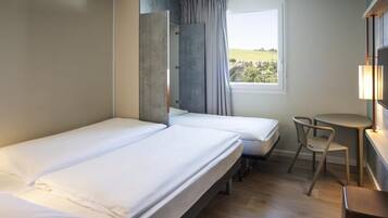 Blackout curtains, soundproofing, free cots/infant beds, free WiFi