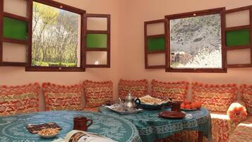 Breakfast, lunch, dinner served; local cuisine