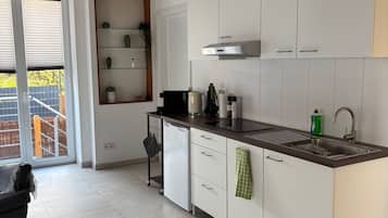 Superior Double Room, Private Bathroom | Private kitchen | Highchair