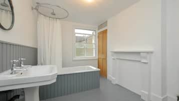 Separate tub and shower, free toiletries, towels