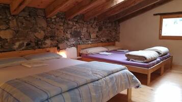 Quadruple Room, Shared Bathroom | Free cribs/infant beds, rollaway beds, bed sheets, wheelchair access