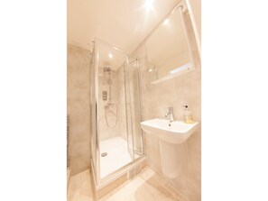 Shower, free toiletries, hair dryer, towels